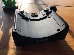 the zoom motor with pogo pins and a gear wheel